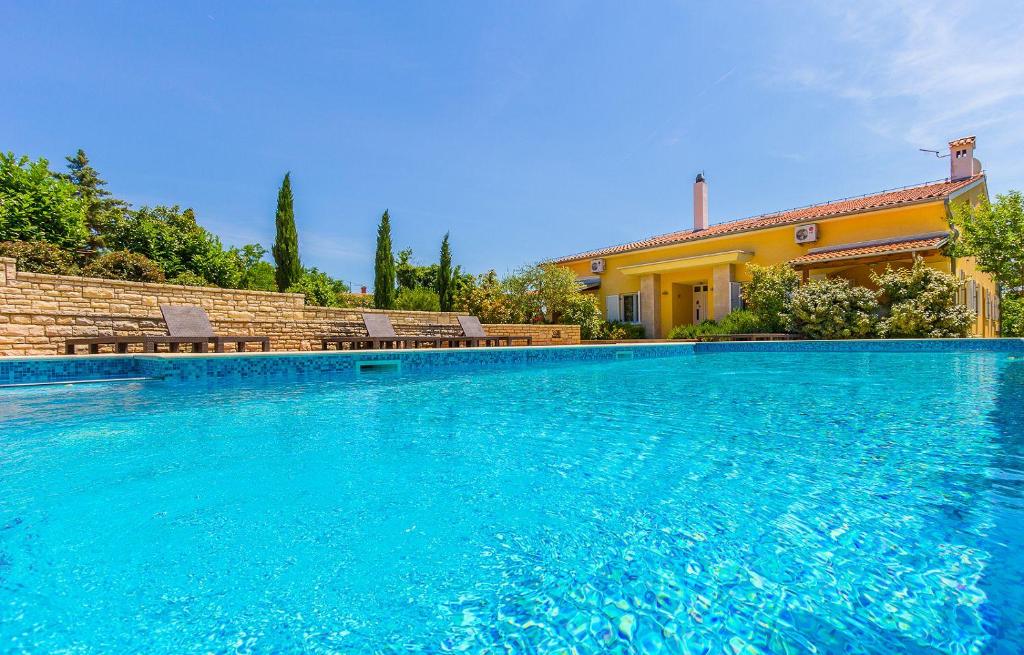 Fotografie z fotogalerie ubytování Ferienwohnung mit großem Pool, Klima, WLAN, Tischtennis v destinaci Valtura