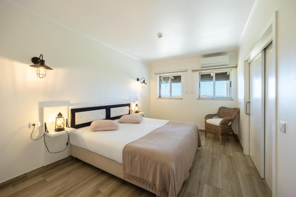 Postel nebo postele na pokoji v ubytování Pontalaia Apartamentos Turísticos