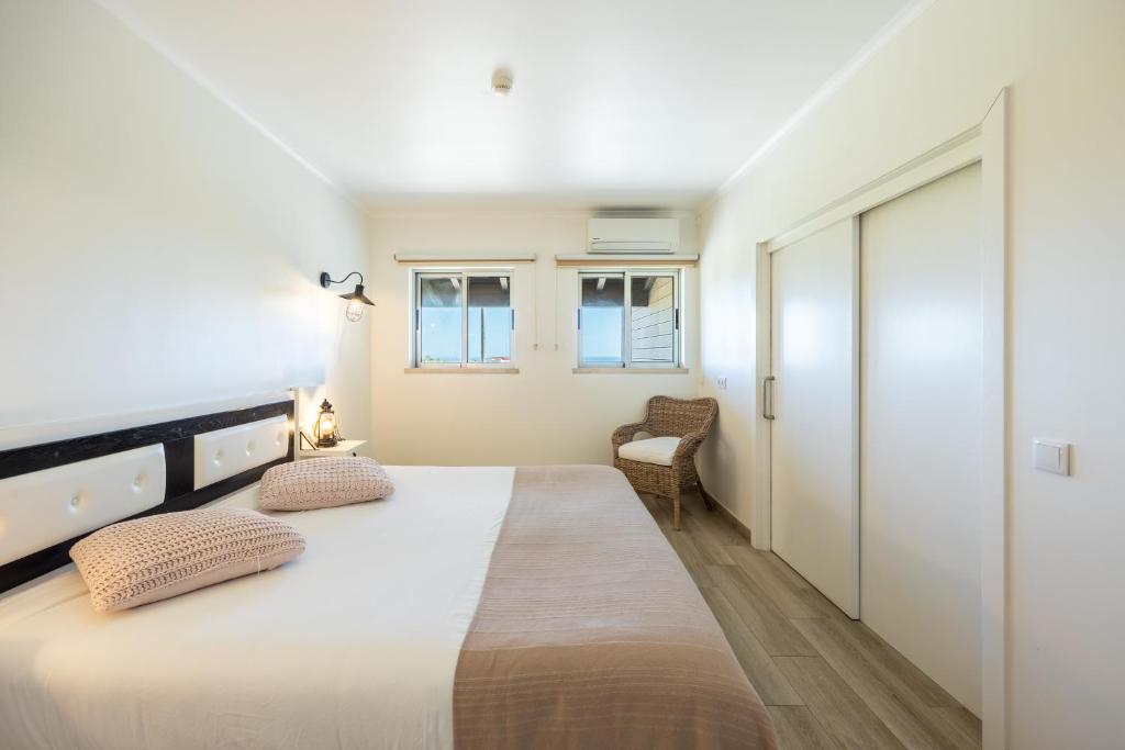 Postel nebo postele na pokoji v ubytování Pontalaia Apartamentos Turísticos