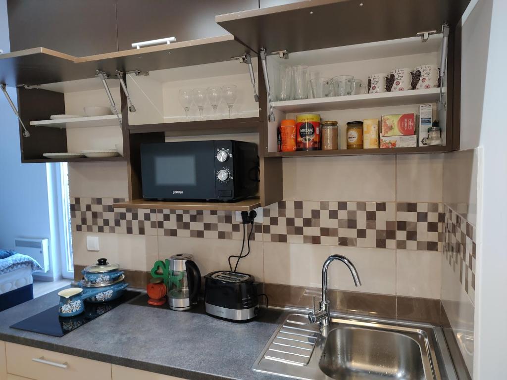 Kuchyň nebo kuchyňský kout v ubytování Apartman 8 Hill Zlatar