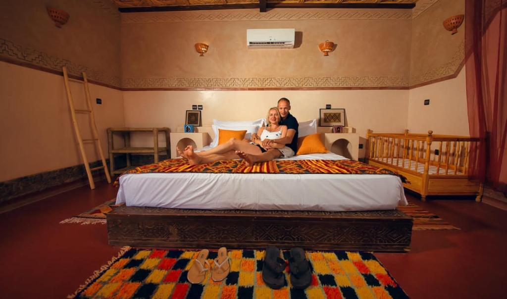 Postel nebo postele na pokoji v ubytování Ecolodge l'île de Ouarzazate