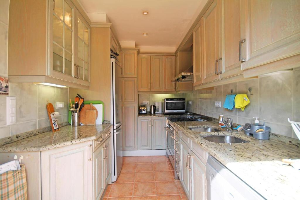 Kuchyň nebo kuchyňský kout v ubytování Holiday Home Anais