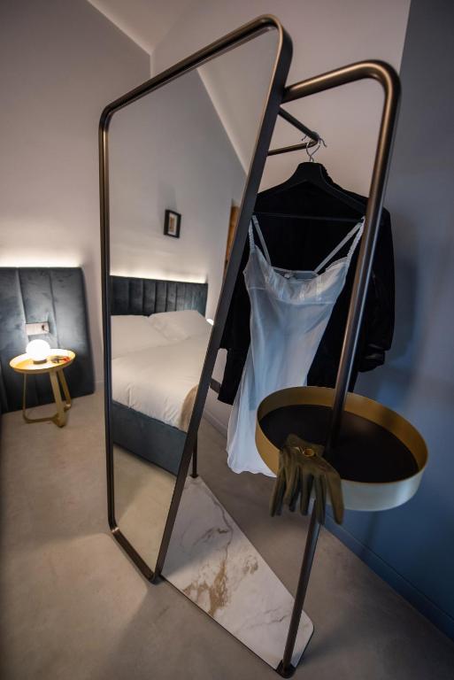 Postel nebo postele na pokoji v ubytování Relais Chiarene