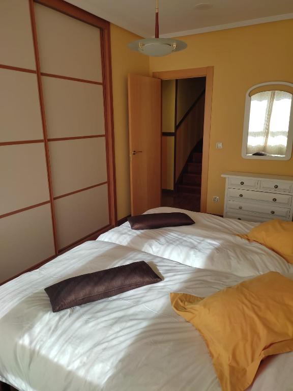 Posteľ alebo postele v izbe v ubytovaní Duplex Boñar