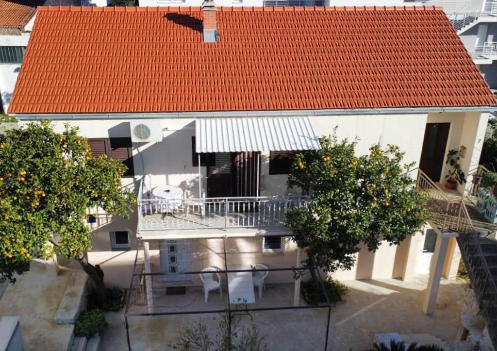 an overhead view of a house with an orange roof at Apartment Jana in Korčula
