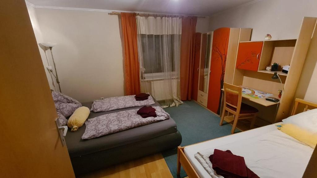 Ferienwohnung Korneuburg bei Wien tesisinde bir odada yatak veya yataklar
