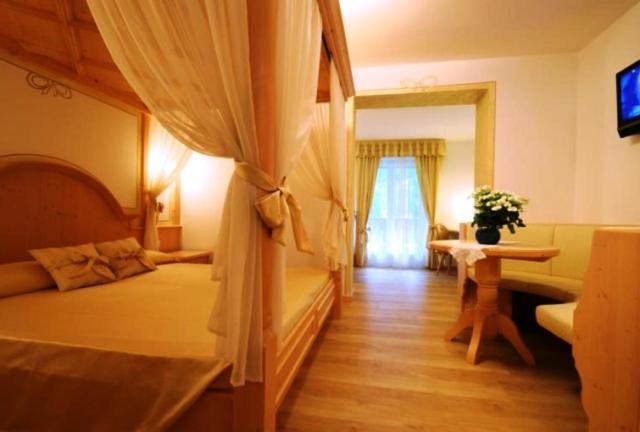 Postel nebo postele na pokoji v ubytování Hotel Bellaria