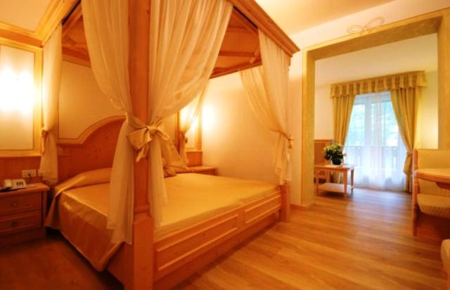 Postel nebo postele na pokoji v ubytování Hotel Bellaria