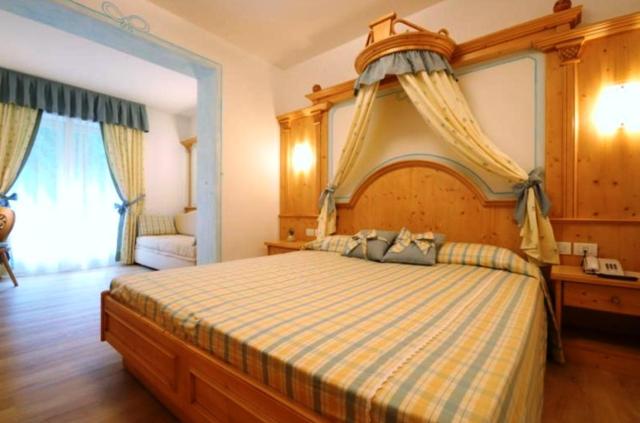 Postel nebo postele na pokoji v ubytování Hotel Bellaria