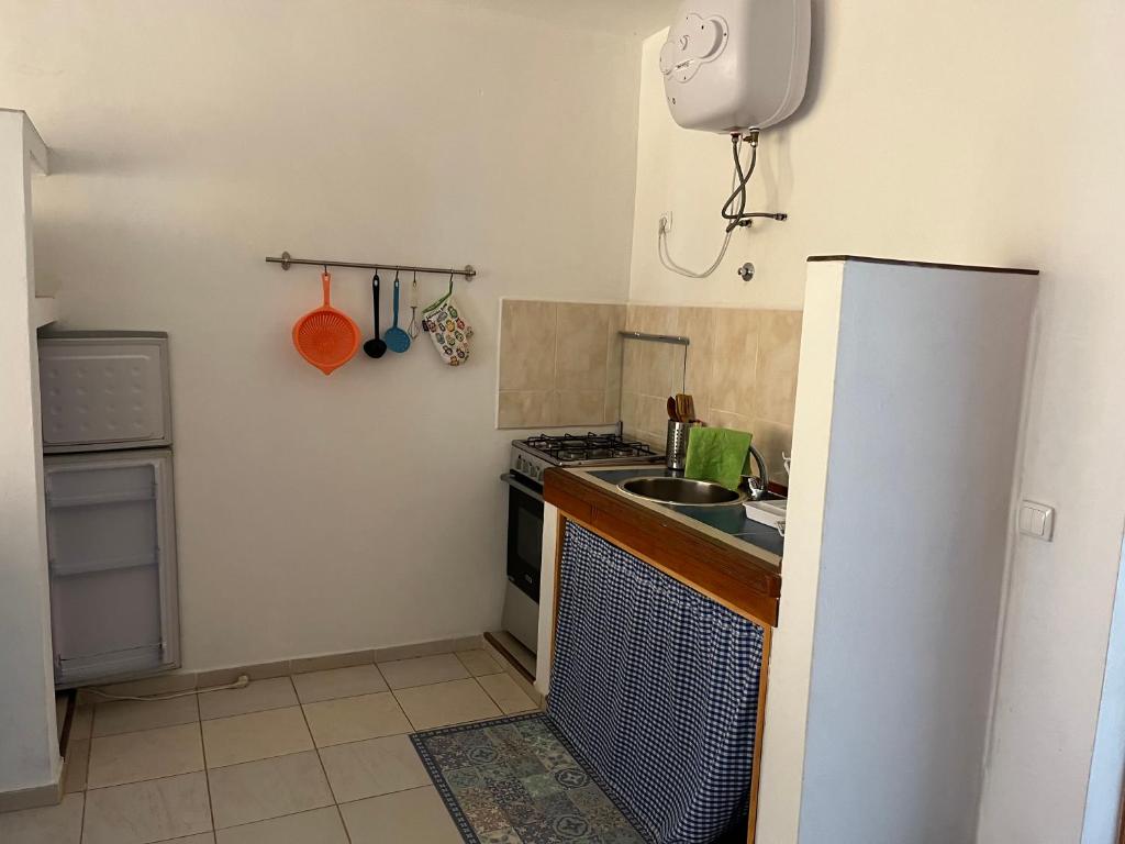 Kuchyň nebo kuchyňský kout v ubytování Beach Rotxa