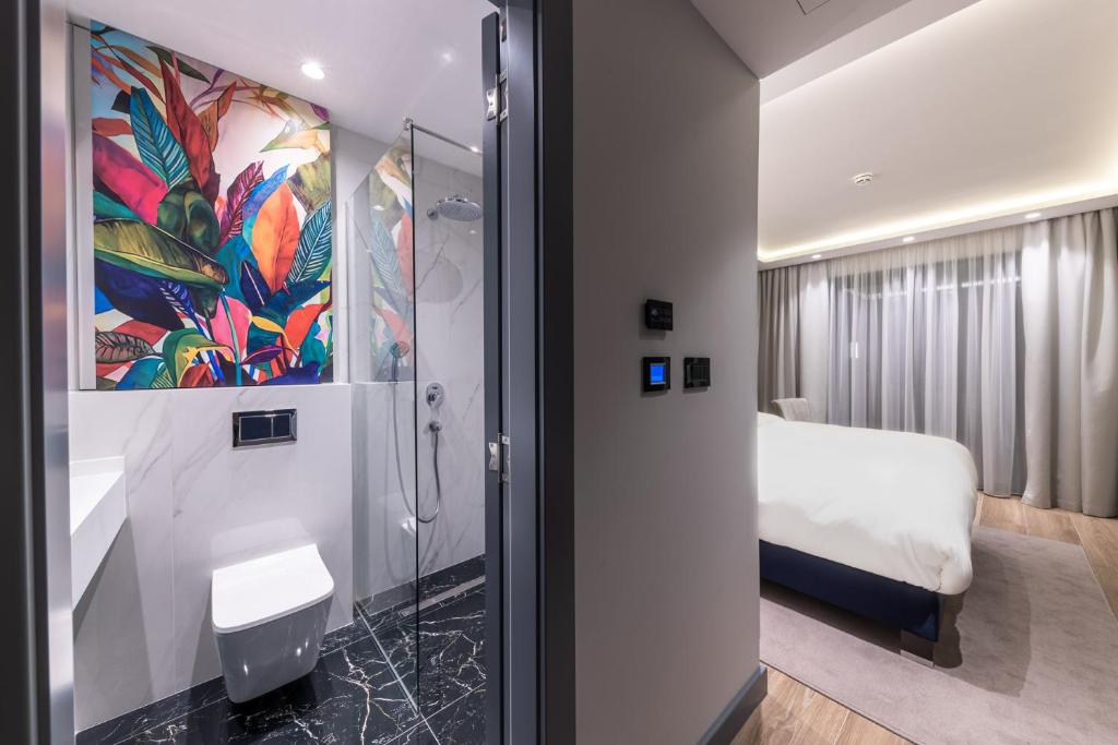 Krevet ili kreveti u jedinici u okviru objekta Calisi Hotel