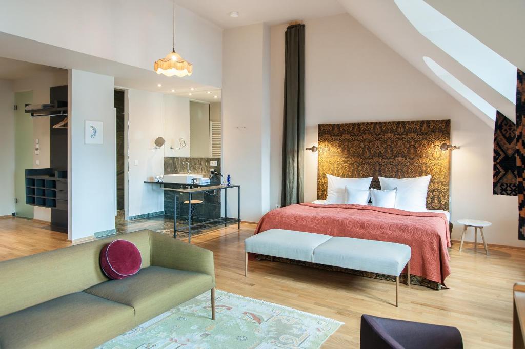 Postel nebo postele na pokoji v ubytování Emmerich Hotel Görlitz