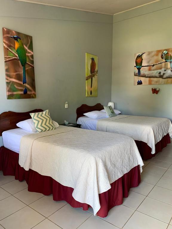Postel nebo postele na pokoji v ubytování Hotel Divisamar by LHR