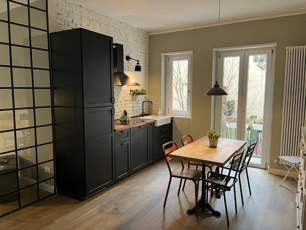 Kuchyň nebo kuchyňský kout v ubytování Santa Chiara 11 - Rooms -Verona