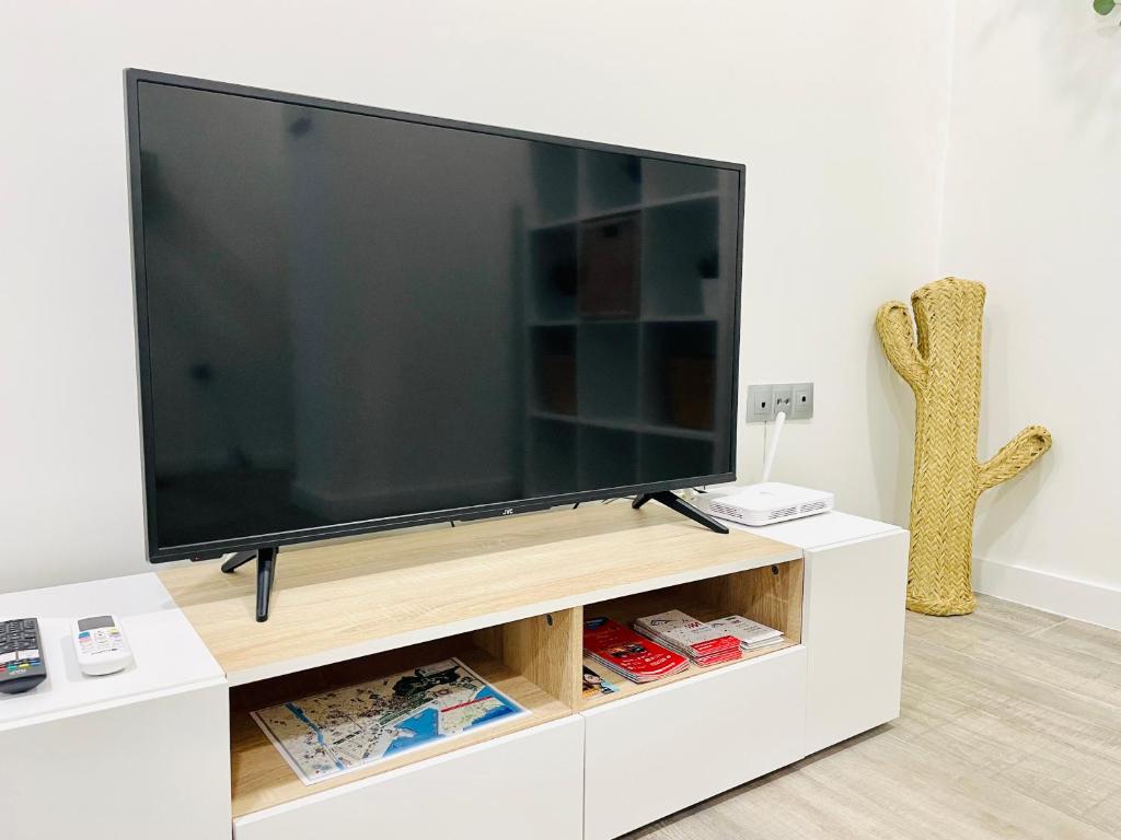 TV a/nebo společenská místnost v ubytování Bien ubicado, completo y nuevo P7