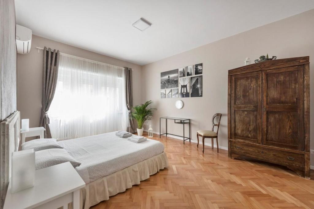 Łóżko lub łóżka w pokoju w obiekcie Regina Luxury Flat