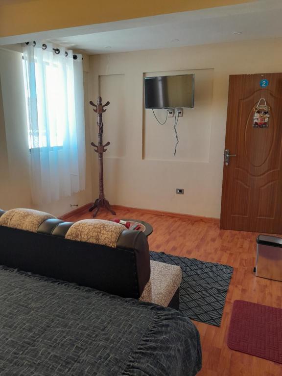 TV a/nebo společenská místnost v ubytování Hostal Nichkito