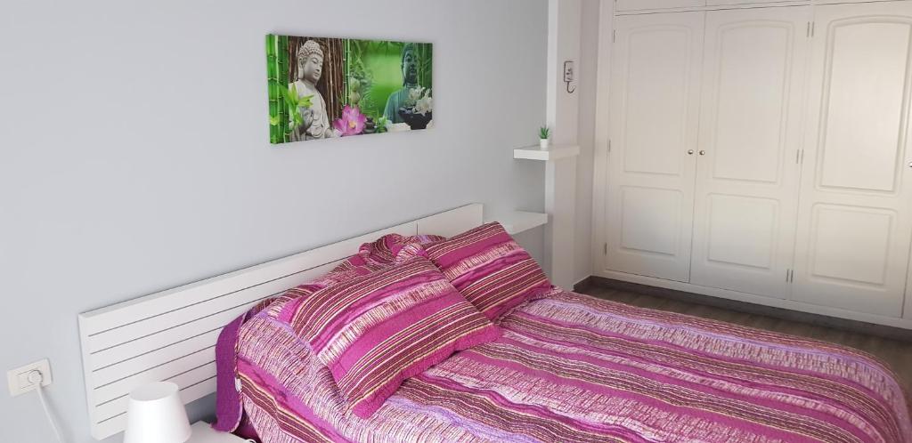 Posteľ alebo postele v izbe v ubytovaní Apartament Los Abrigos -Tenerife