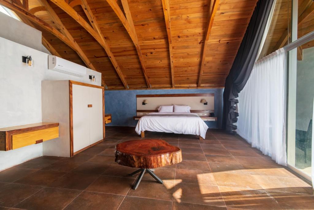 Postel nebo postele na pokoji v ubytování Hotel Balcón del Parque