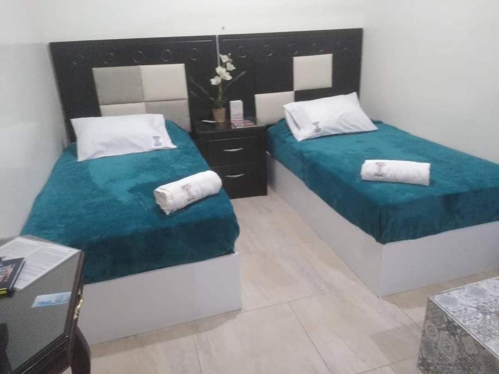 Postel nebo postele na pokoji v ubytování HOTEL MESON POSADA