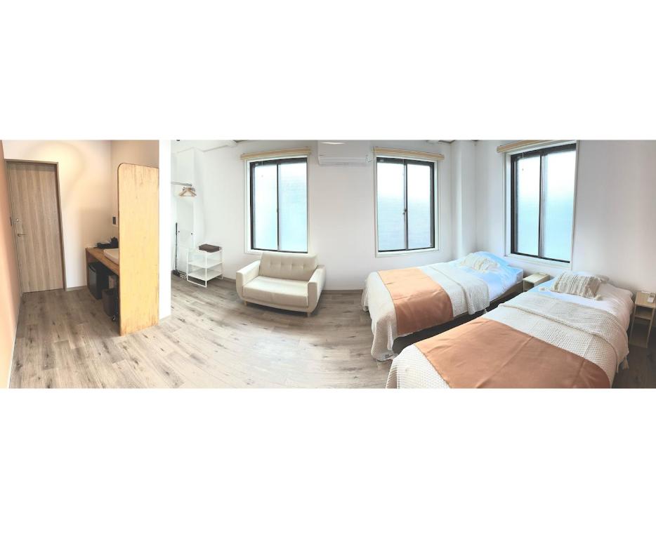 Postel nebo postele na pokoji v ubytování CABIN Nozawaonsen