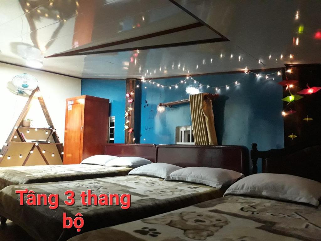 Postel nebo postele na pokoji v ubytování Bình Đào Hotel - Khách sạn ngay trung tâm giá rẻ