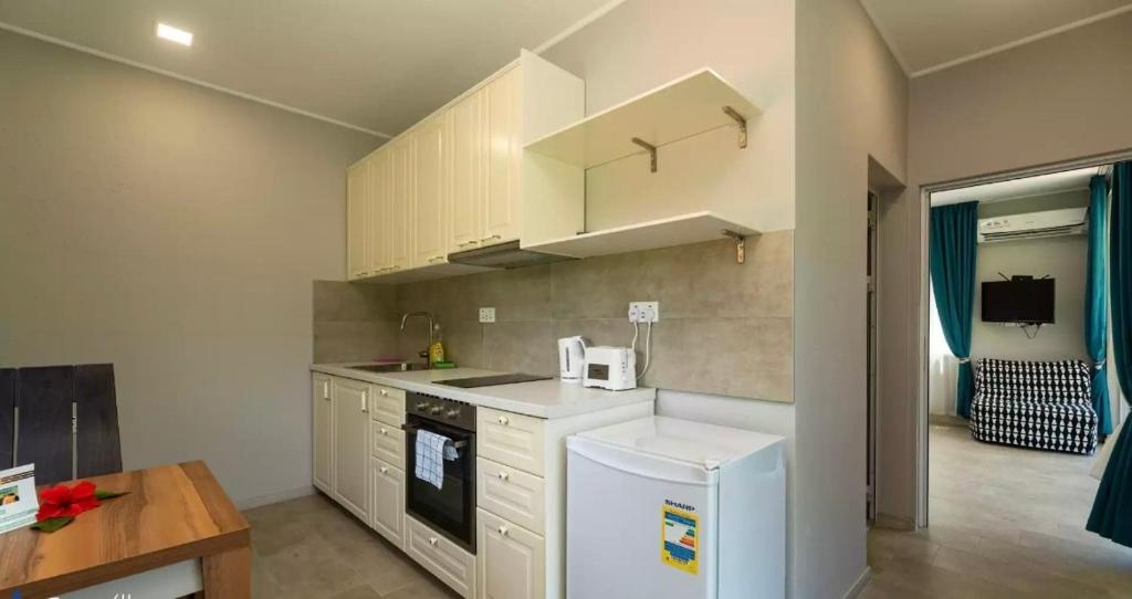 Kuchyň nebo kuchyňský kout v ubytování Takamakasky Villas