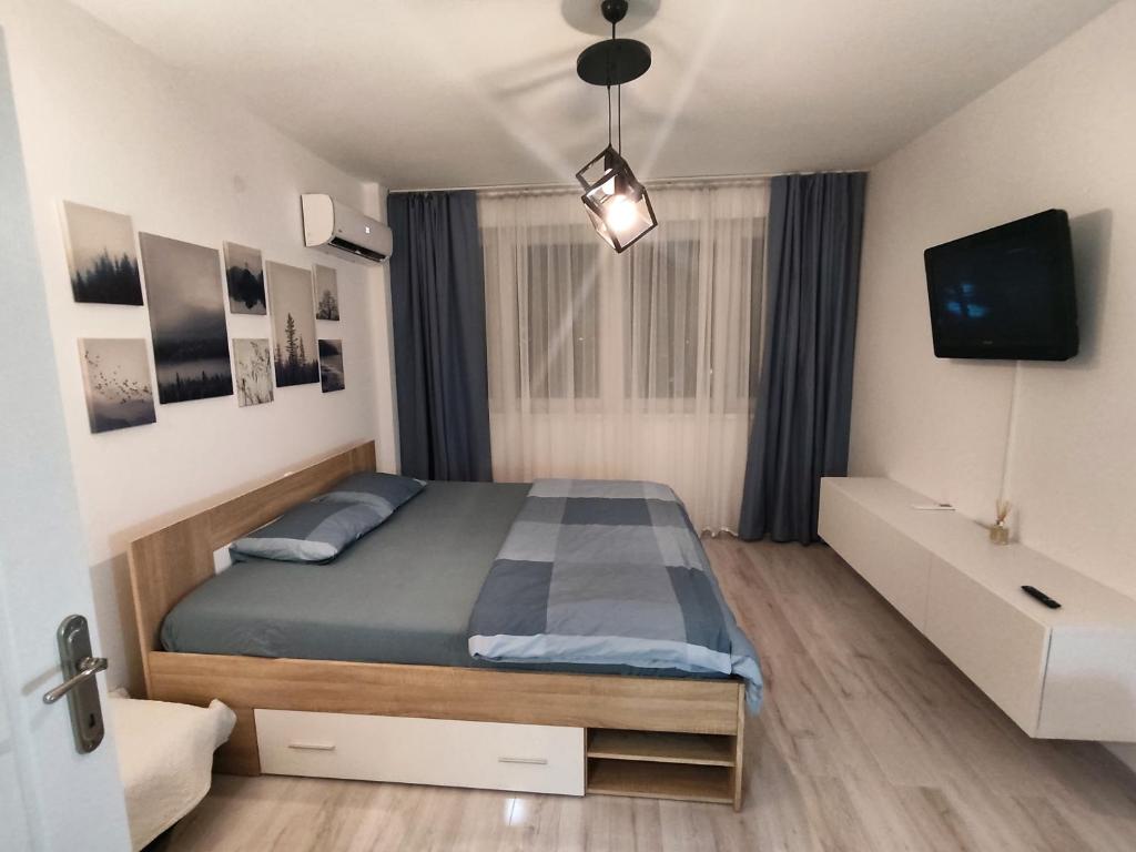 Tempat tidur dalam kamar di Stan na dan Brcko centar grada