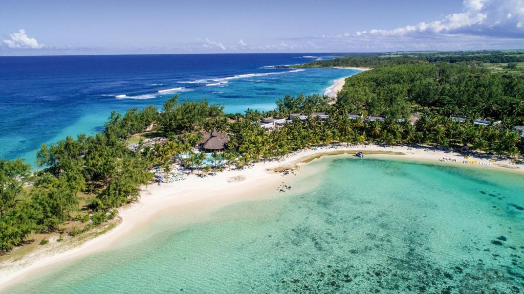 an aerial view of the beach at the excellence punta cana resort at Shandrani Beachcomber Resort & Spa in Blue Bay