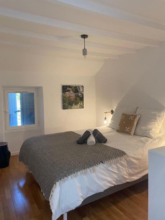 Postel nebo postele na pokoji v ubytování VILLA BEL - Entre paradis et vignes
