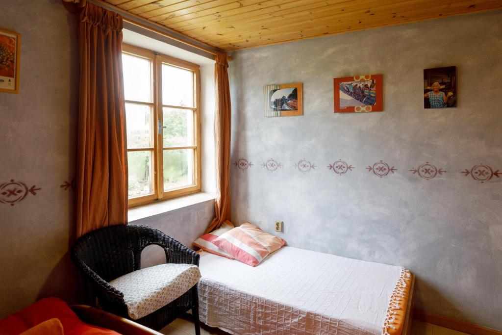 Postel nebo postele na pokoji v ubytování Chalupa v Meziluzi