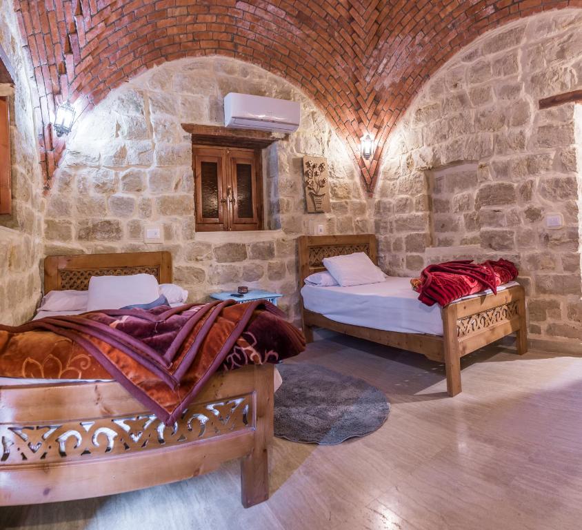 Postel nebo postele na pokoji v ubytování Zad El Mosafer Guest House