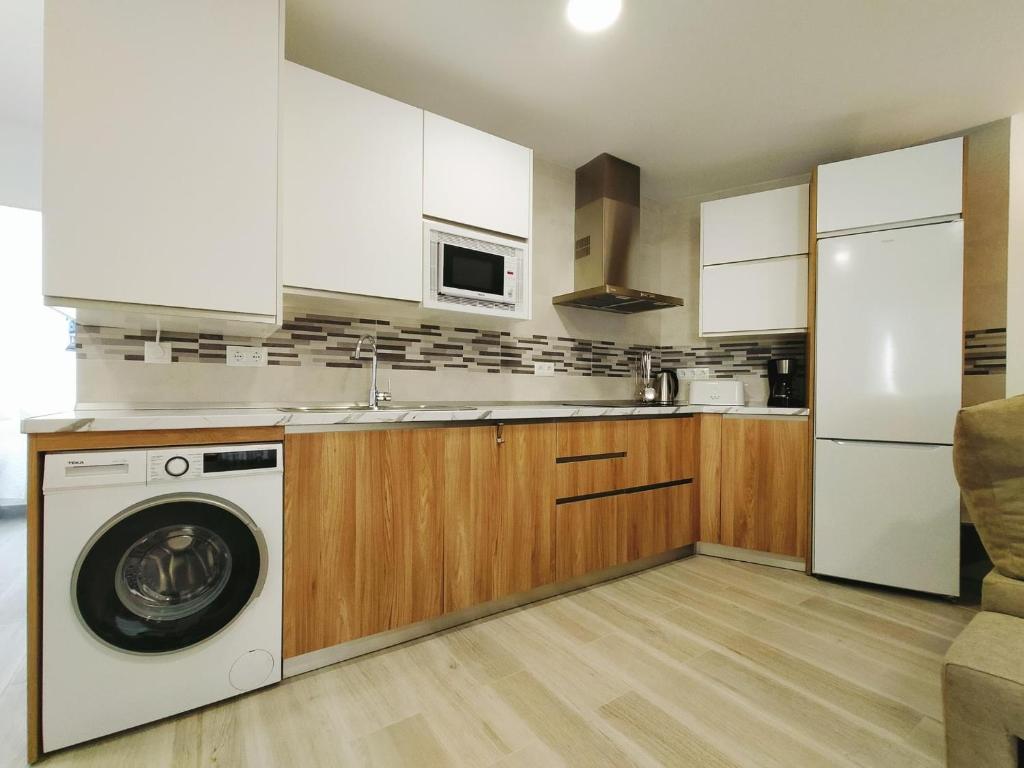 Kuchyň nebo kuchyňský kout v ubytování Nerja Sun Apartment Bronce A Centro
