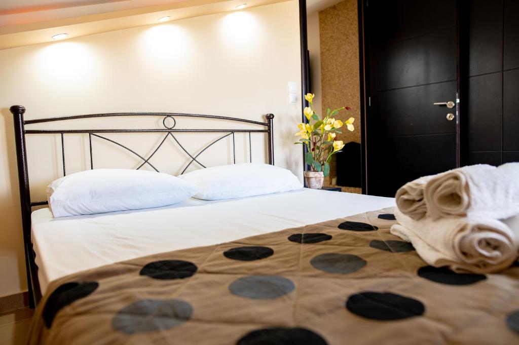 Ένα ή περισσότερα κρεβάτια σε δωμάτιο στο Nikitas Apartments & Loft