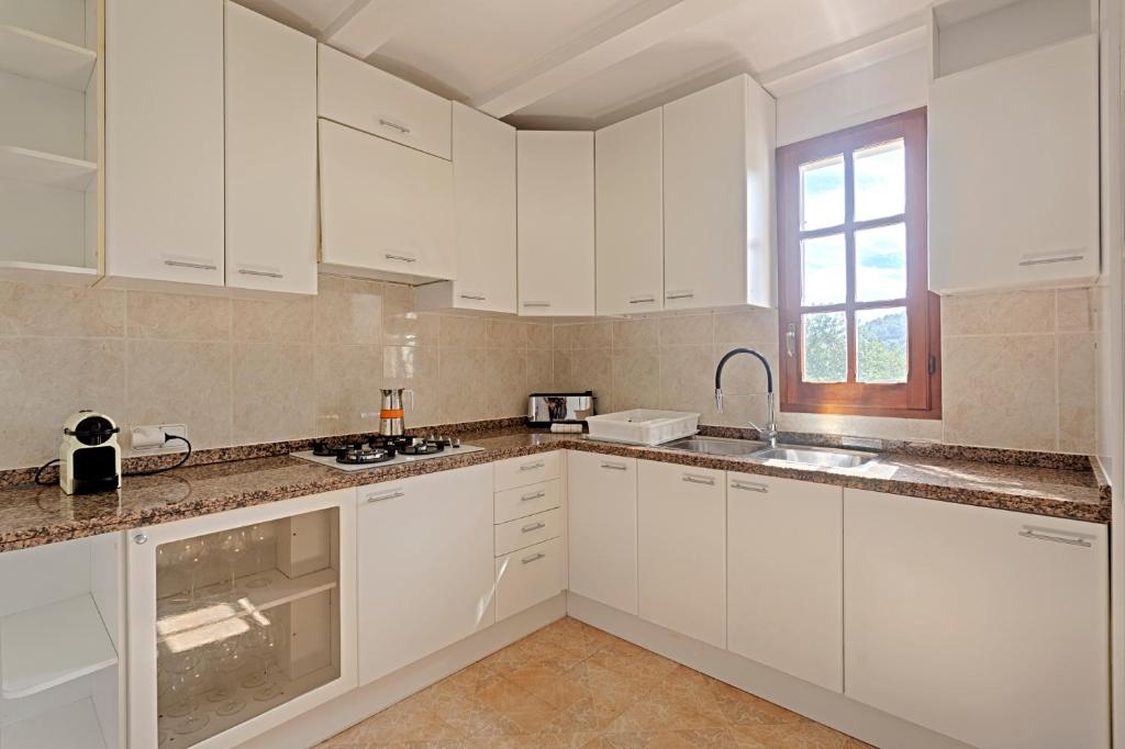 Kuchyň nebo kuchyňský kout v ubytování Villa Cana Simona