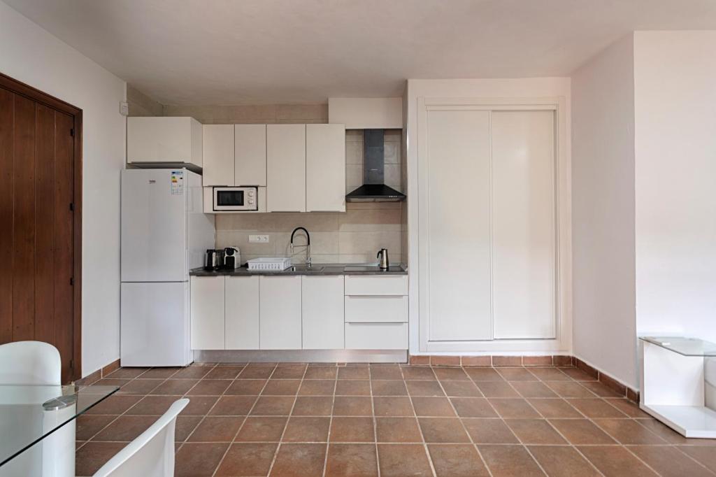 Kuchyň nebo kuchyňský kout v ubytování Villa Cana Simona