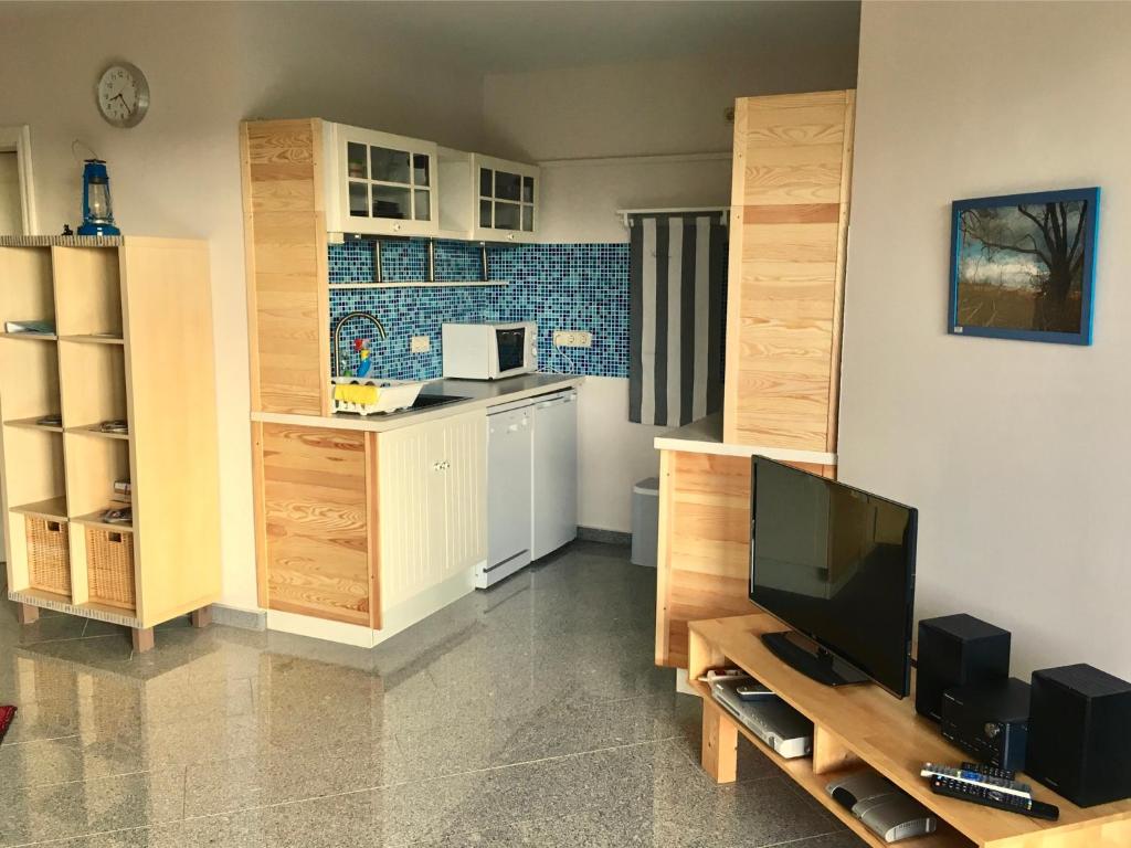 Kuchyň nebo kuchyňský kout v ubytování Wohnen am Yachthafen