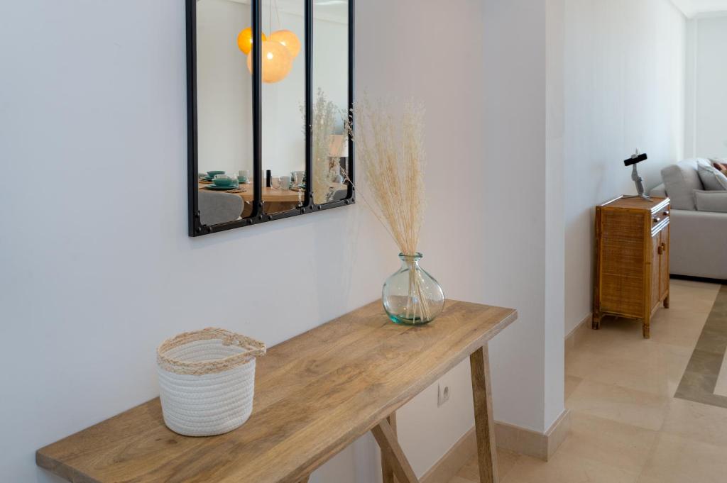 A bed or beds in a room at Los Eucaliptos Appartement deux chambres Chez Stefan