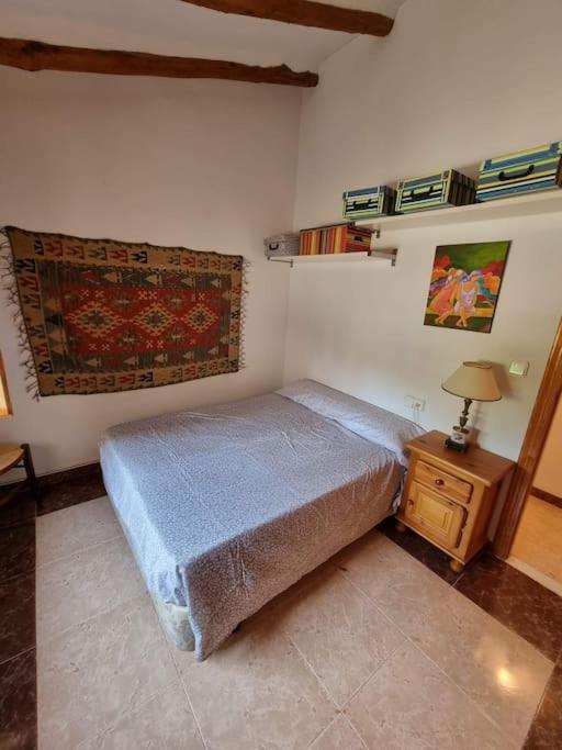 Postel nebo postele na pokoji v ubytování El Rulón, gran villa rural con piscina privada