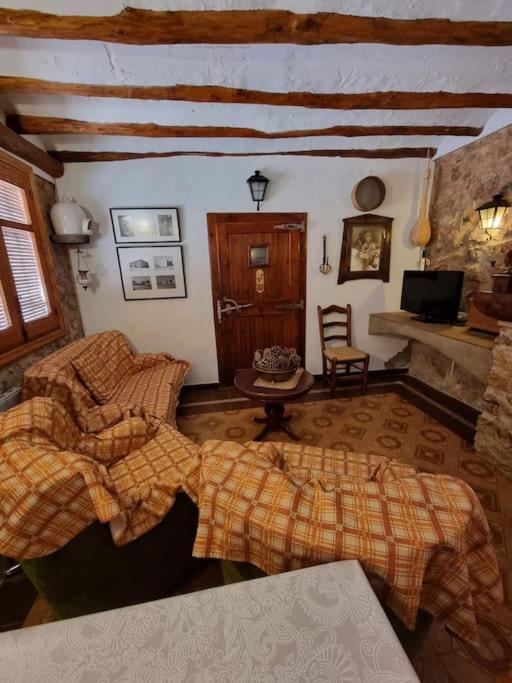 Postel nebo postele na pokoji v ubytování El Rulón, gran villa rural con piscina privada