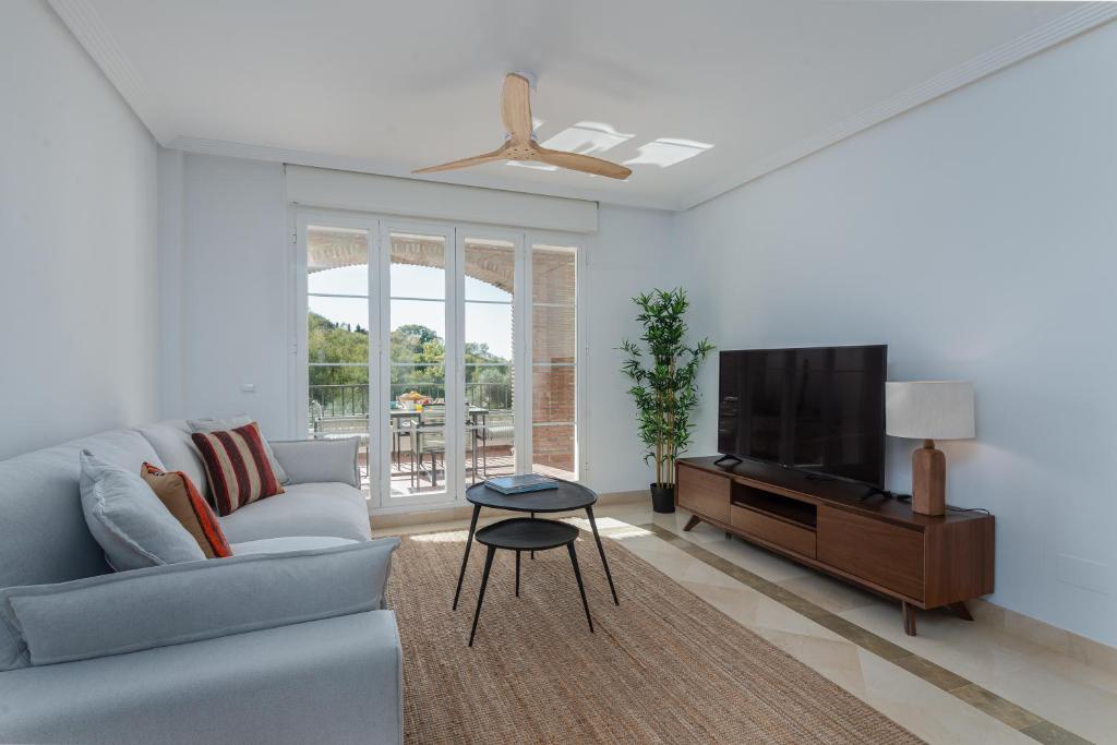 A seating area at Los Eucaliptos Appartement deux chambres Chez Stefan