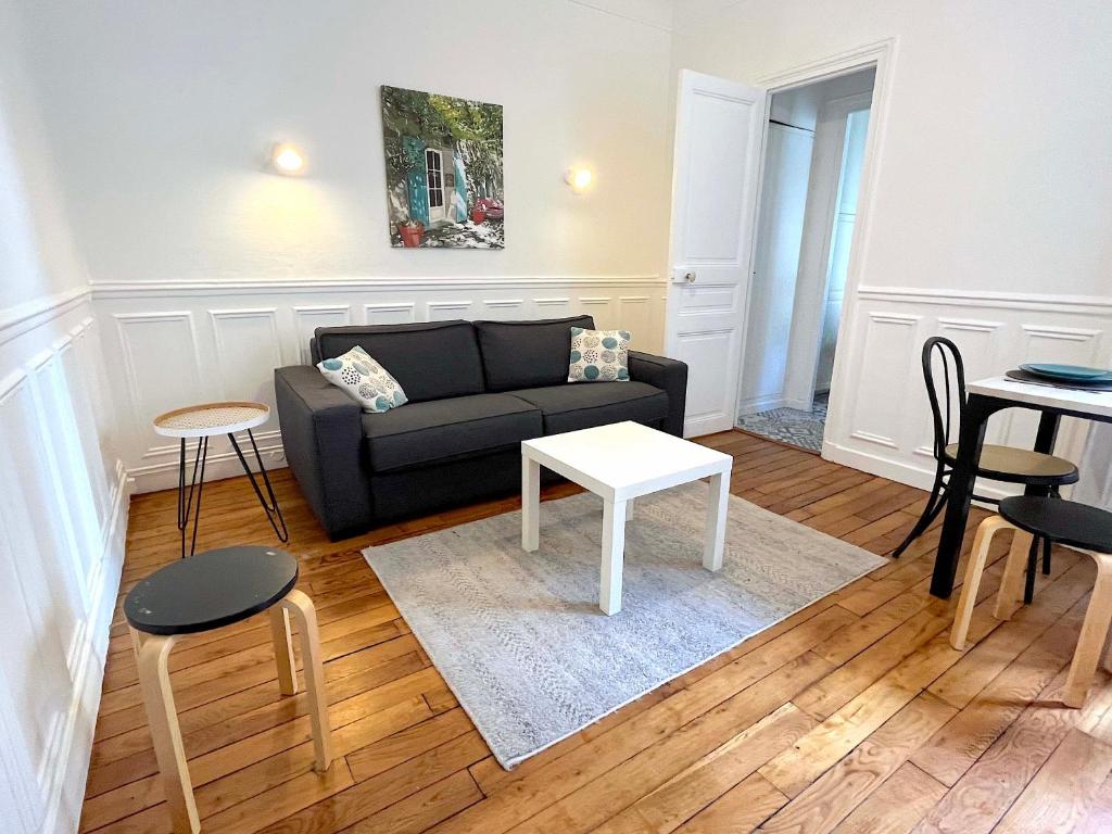 Posedenie v ubytovaní L'appartement Lecourbe