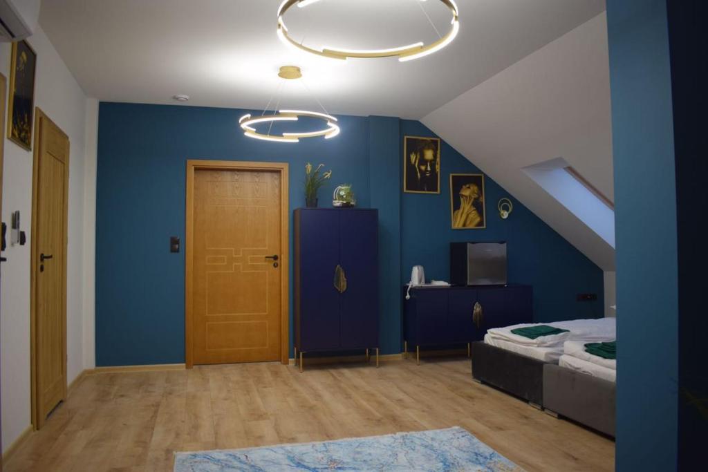 Łóżko lub łóżka w pokoju w obiekcie Mały Książę
