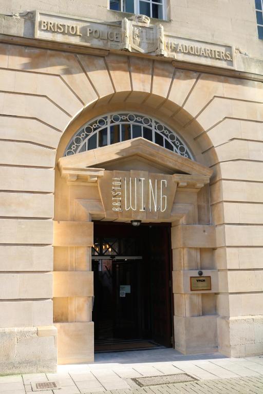 a building with the entrance to theungivatingivating at The Bristol Wing in Bristol