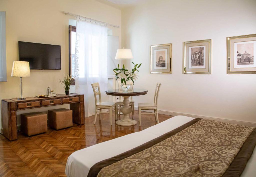 TV a/nebo společenská místnost v ubytování Boutique Hotel del Corso