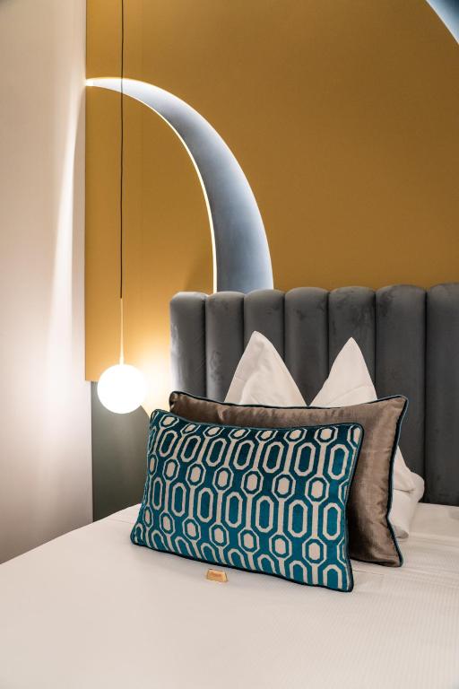 Postel nebo postele na pokoji v ubytování Relais sul Mare Boutique Hotel