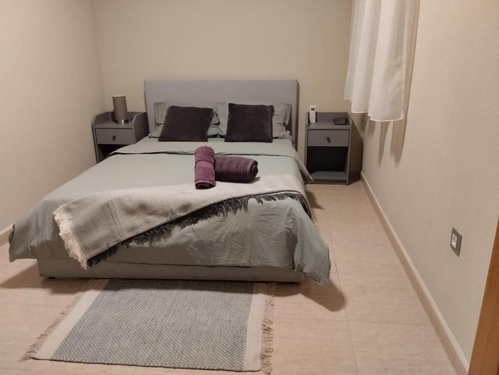 Postel nebo postele na pokoji v ubytování Comfortable Apartment in Excellent Location