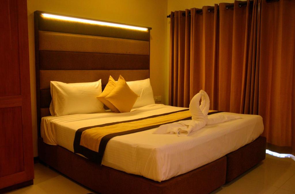 Postel nebo postele na pokoji v ubytování Beach Corridor Hotel & Spa with Free Airport shuttle