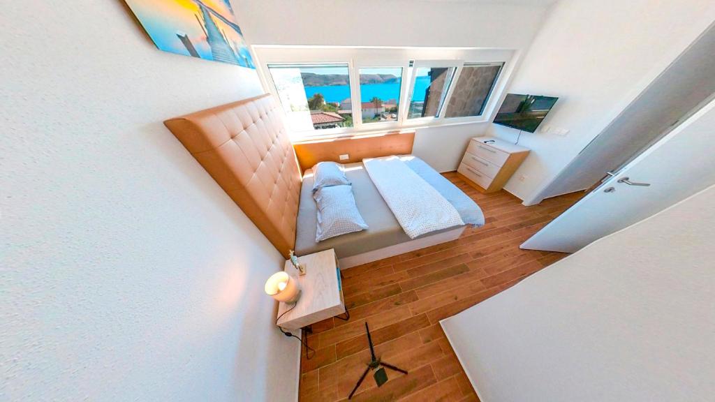 Postel nebo postele na pokoji v ubytování Rtina Appartements