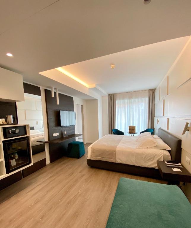 Postel nebo postele na pokoji v ubytování Solho Hotel